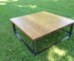 chestnut coffee table with sq metal base by Dale