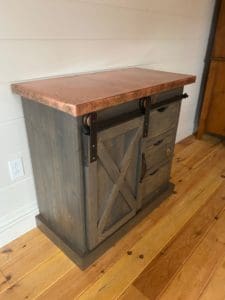 Barn door cabinet with copper top