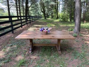 Trestle table made in reclaimed oak